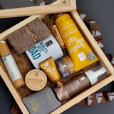 Nokware skincare Father's day box with various products in a wooden box on a dark background